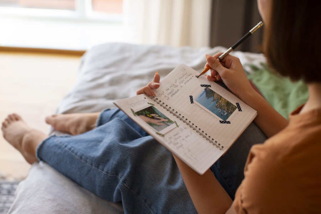 Woman reflecting on her journal 