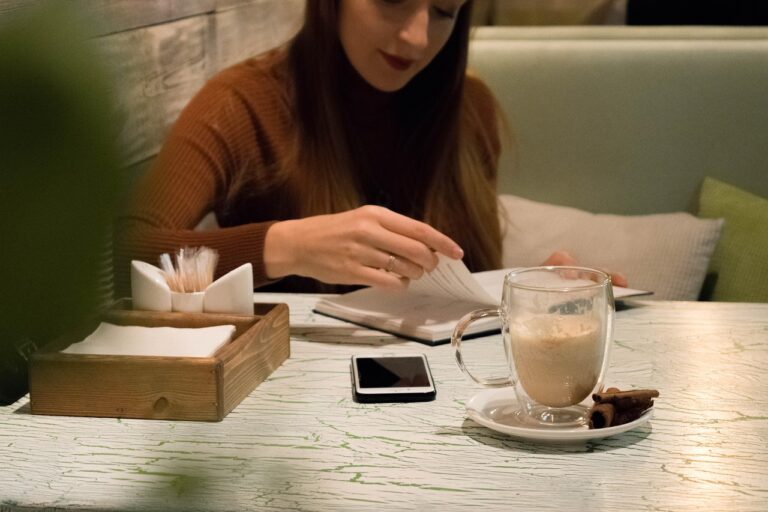 overwhelmed mother using a daily planner 2025
